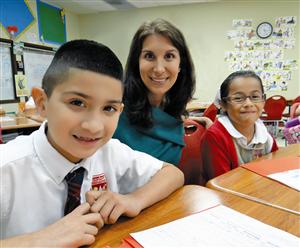 Yasmin Bhatia, CEO of Uplift Education with Uplift scholars